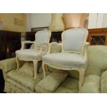 A pair of Salon armchairs