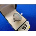 An 18ct Gold hallmarked Opal and Diamond ring,