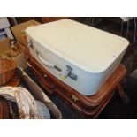 Two leather suit case sets; graduated three and two,
