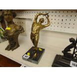 A bronze figure on base,