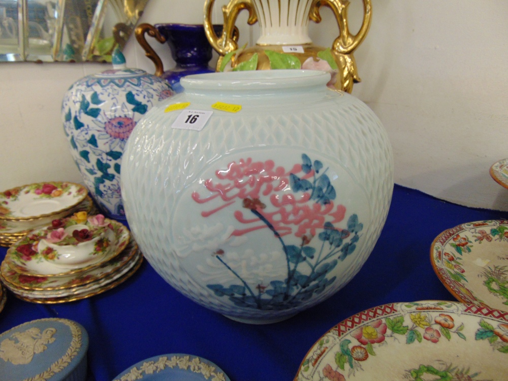 A large circular contemporary vase