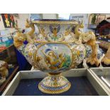 A late 19th/ early 20th century large Majolica Urn, hand painted,