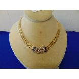 An 18ct Gold, Diamond and Sapphire necklace,