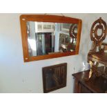 A pine framed wall mirror