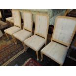 Eight limed Oak upholstered dining chairs