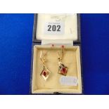 A pair of 18ct Gold Ruby earrings, approx.