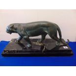 A retro bronze Leopard on a marble base, restoration to tail, a.