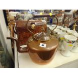 A Victoria copper kettle with brass trim