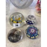 Four assorted paperweights; Millifore,