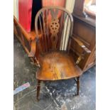 A Windsor wheel back elbow chair