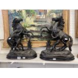 A pair of Pewter Horses with riders on stand