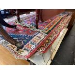 A pair of eastern rugs plus another