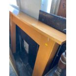 A wooden fire surrounds plus marble insert