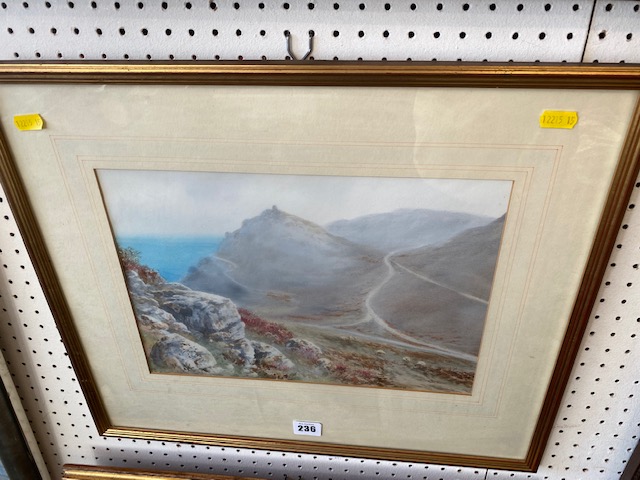 A framed watercolour landscape