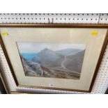 A framed watercolour landscape