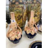 A pair of hand painted vases, Thomas Foresters,