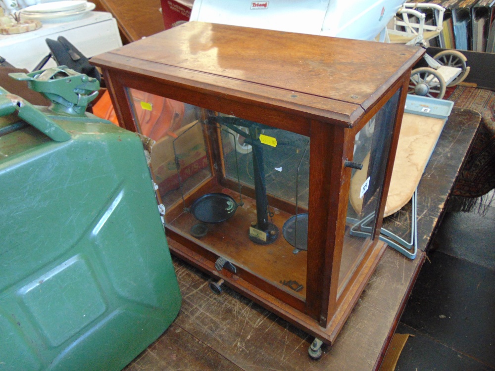 Laboratory scales in cabinet