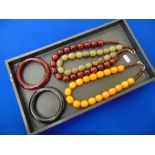 Five coloured beaded necklaces and bangles