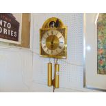 A brass face/ wall clock