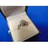 A 9ct Gold Diamond cluster ring,