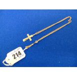 A 9ct Gold Crucifix on a 9ct Gold chain
