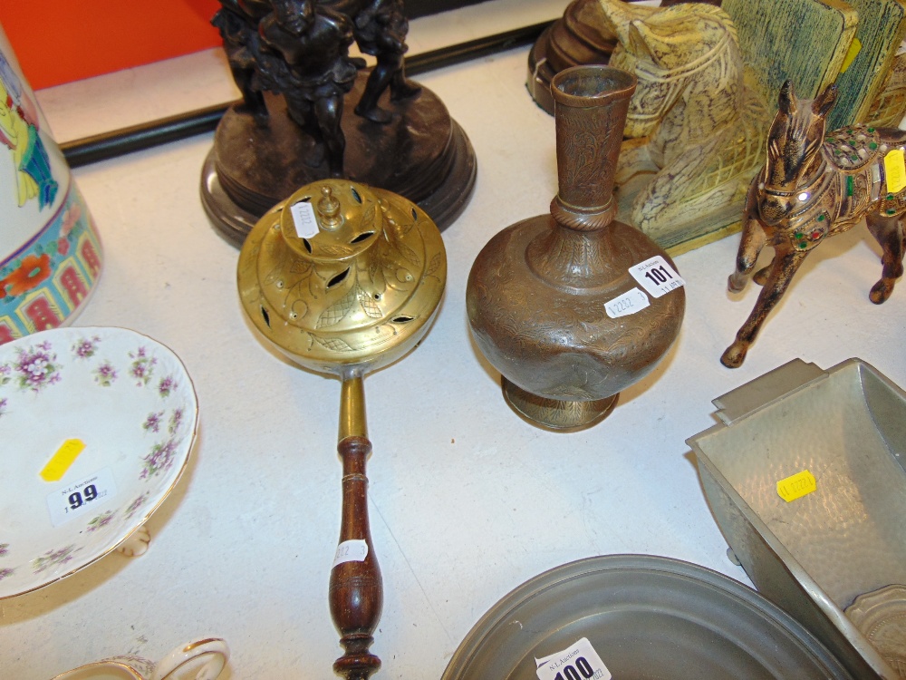 An antique brass cauldron and a vase a.