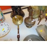 An antique brass cauldron and a vase a.