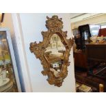 A decorative shaped mirror