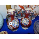 A pair of pottery vases,