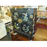 A lacquered china cabinet