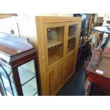 A large wooden display cabinet,