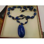 An Artdeco Imperial Lapis Lazuli necklace set with Pearl and with gold beads and clasp