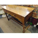 An Oak hall table with two drawers