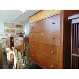 A retro five drawer chest and a dressing table