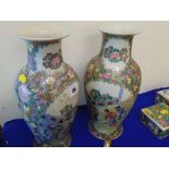 A pair of small Canton style vases