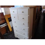 A White eight drawer chest