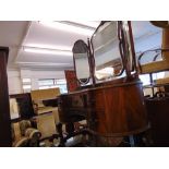 A Walnut kidney shaped dressing table