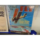 A vintage Learn to fly metal poster, 40.