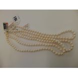 A set of three Pearl necklaces,