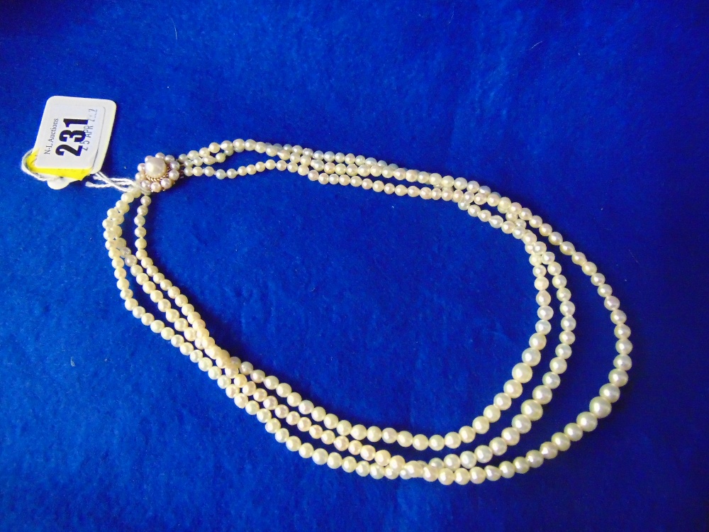 Three row graduated Pearl necklace with 9ct Gold clasp