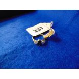 An 18ct gold, Diamond and Sapphire ring,