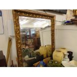 A large gilt mirror