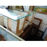 Two stone side tables,