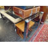 A glass top dining table