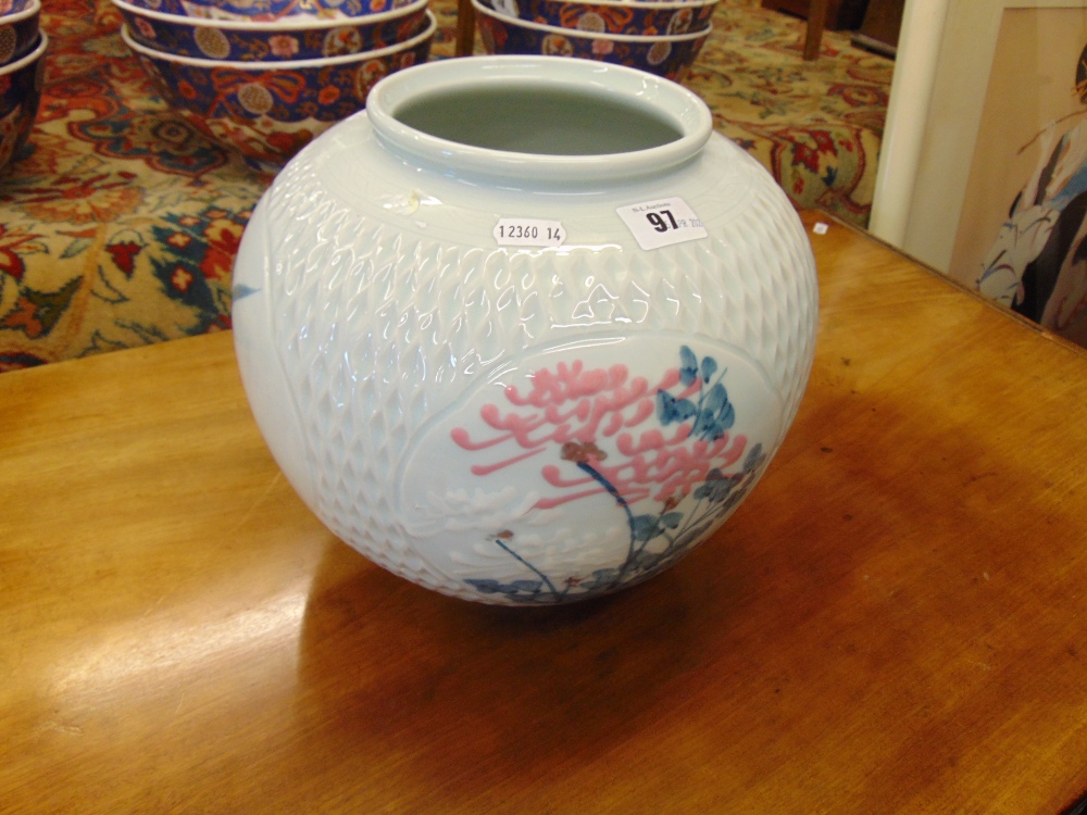 An Oriental floral blue vase