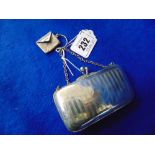 A hallmarked Silver purse leather inside with attached stamp holder,