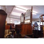 A Walnut kidney shaped dressing table