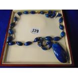 An Artdeco Imperial Lapis Lazuli necklace set with Pearl and with gold beads and clasp