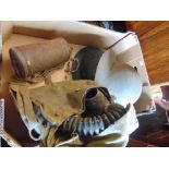 Two WW11 tin helmets, gas masks etc.