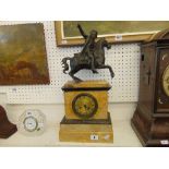 A marble and spelter mantle clock,